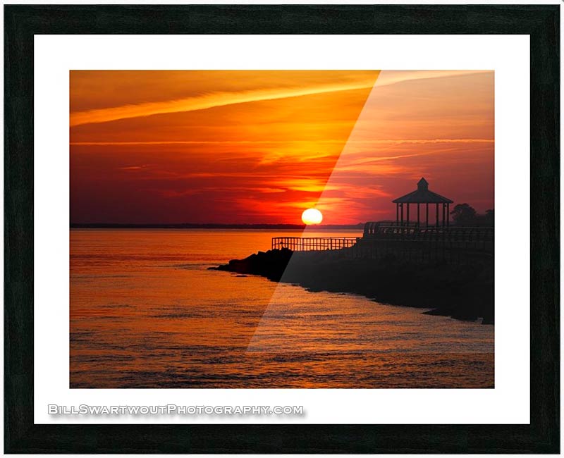 red sky at night over the indian river inlet and bay